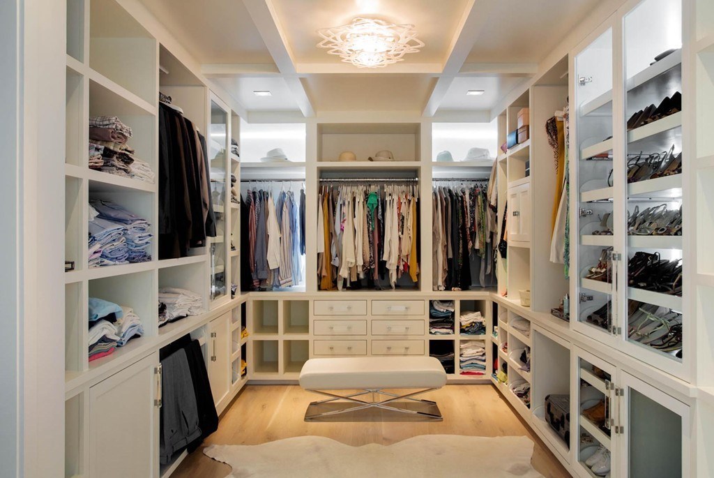 63 Westcliff Road Weston, MA 02493 - Photo 19 of 30 a view of walk in closet with clothes and shoes