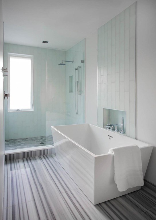 63 Westcliff Road Weston, MA 02493 - Photo 23 of 30 a spacious bathroom with a bathtub and shower