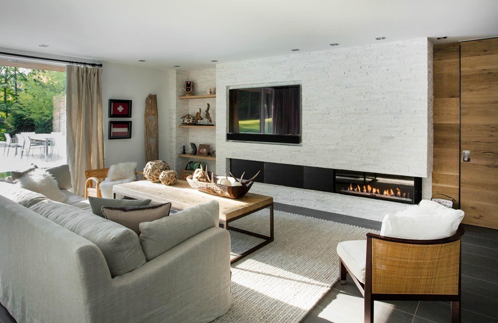 63 Westcliff Road Weston, MA 02493 - Photo 25 of 30 a living room with furniture and a flat screen tv