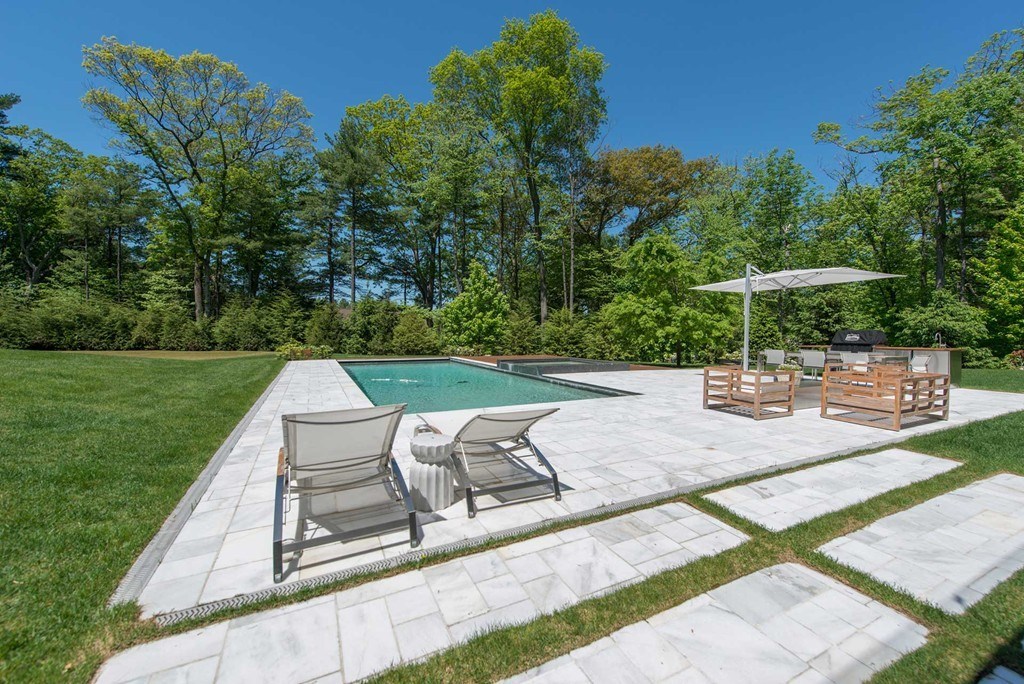 63 Westcliff Road Weston, MA 02493 - Photo 27 of 30 a view of a backyard with sitting area