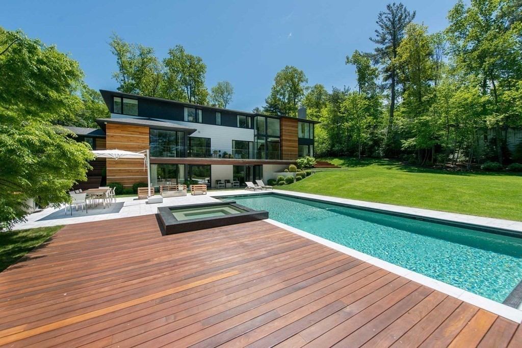 63 Westcliff Road Weston, MA 02493 - Photo 4 of 30 a view of swimming pool with lounge chair