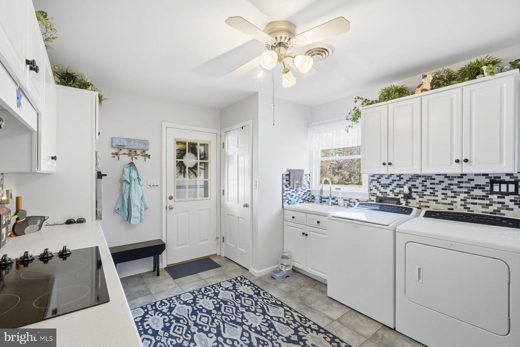 8515 Deep Cove Road Easton, MD 21601 - Photo 26 of 55 a spacious bathroom with a sink a mirror and a shower