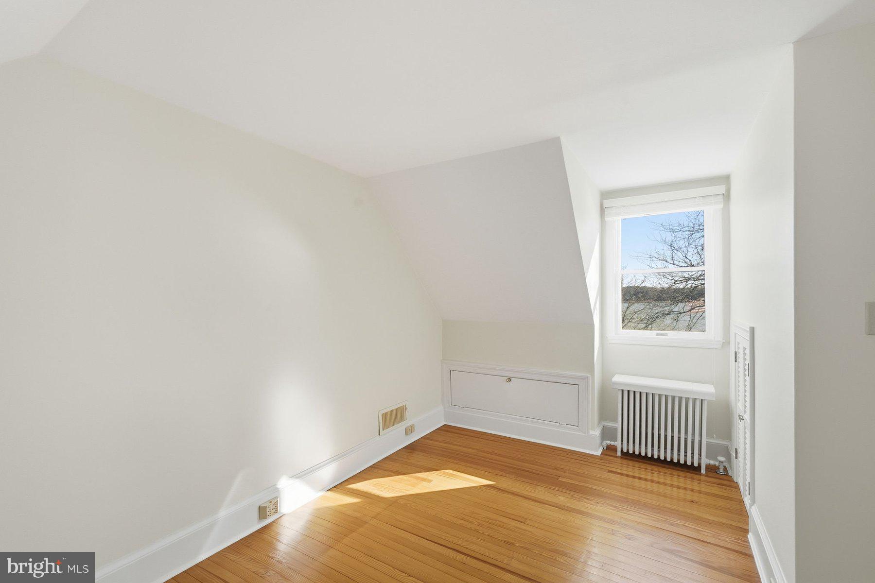 8515 Deep Cove Road Easton, MD 21601 - Photo 42 of 55 a view of empty room with wooden floor