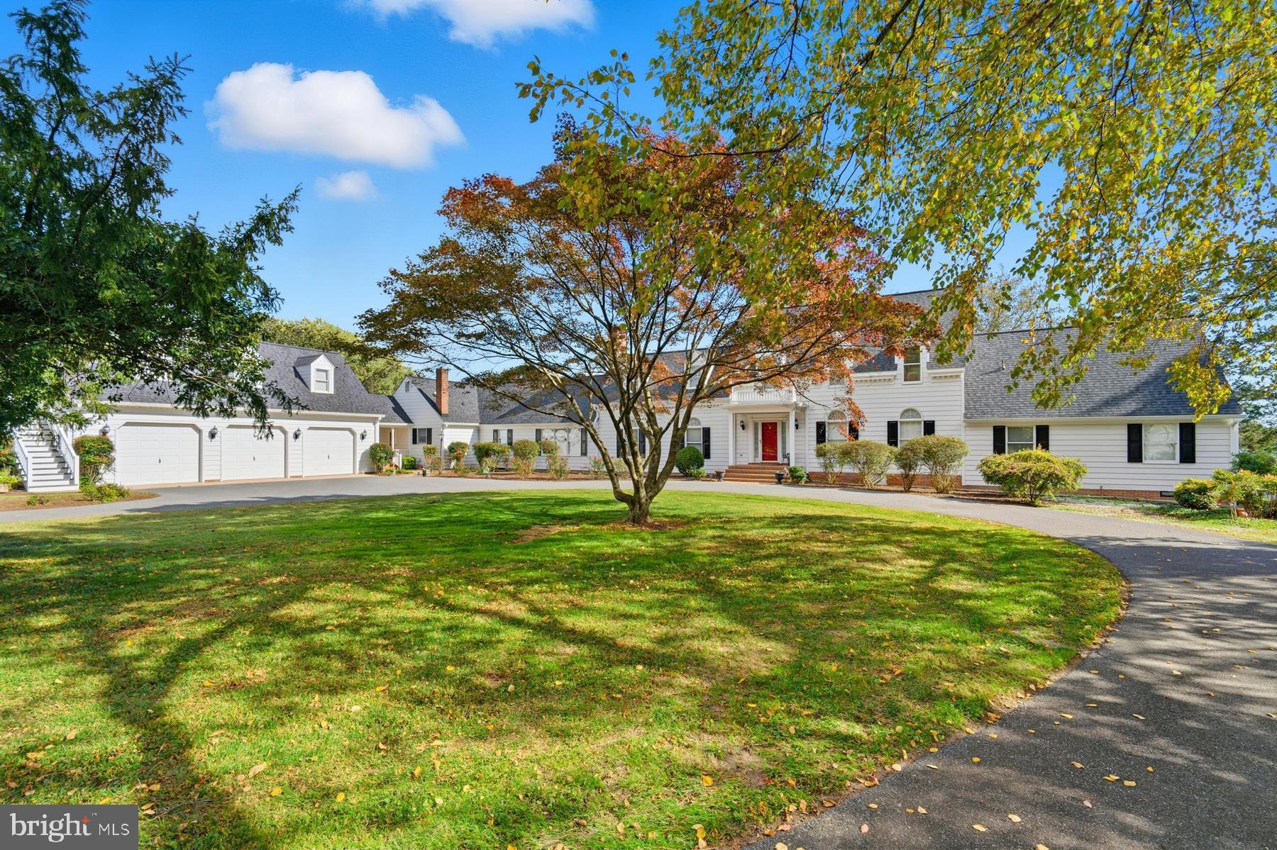 8515 Deep Cove Road Easton, MD 21601 - Photo 6 of 55 a view of a house with a yard