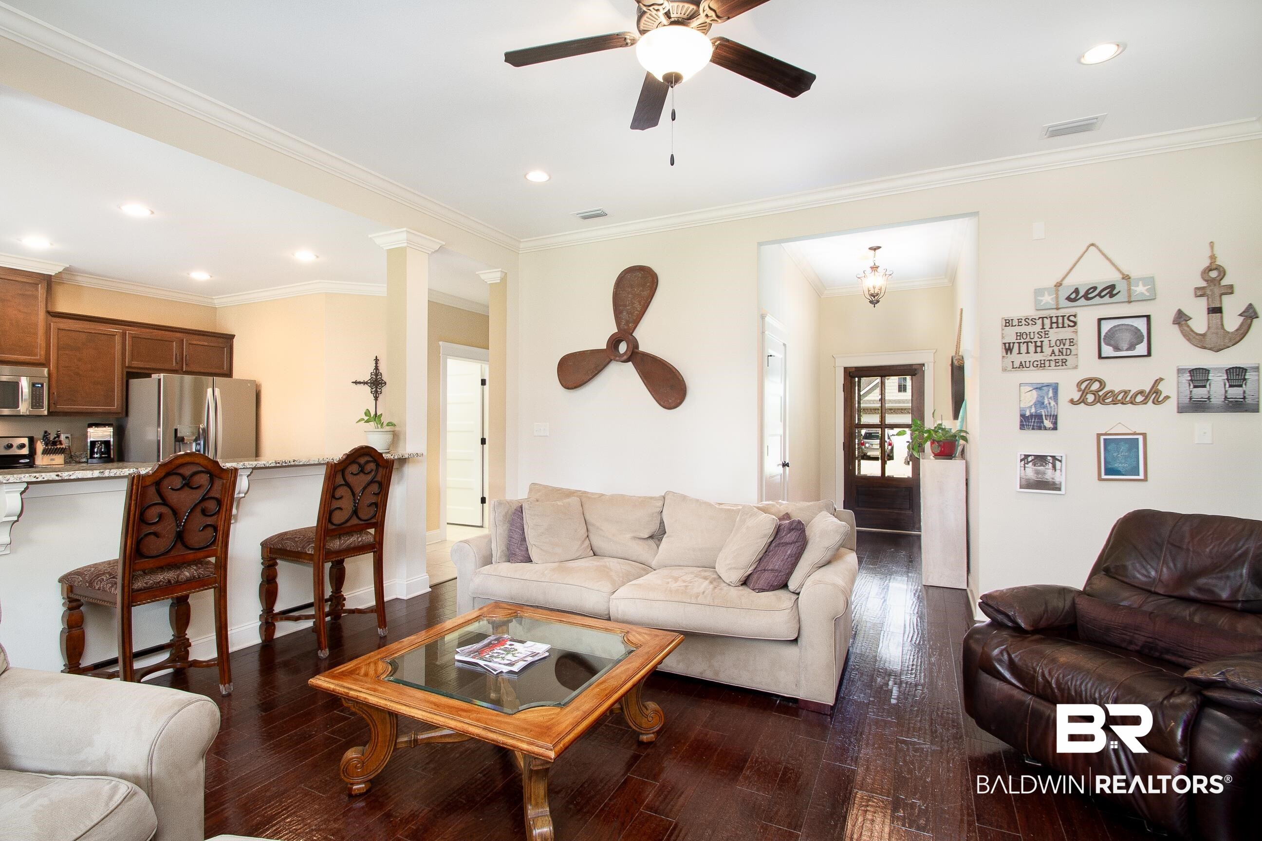 8625 Rosedown Lane Daphne, AL 36526 - Photo 5 of 29 Living room with crown molding, dark hardwood / wood-style floors, and ceiling fan