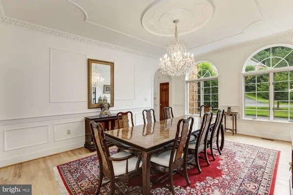 a view of a livingroom with furniture window and wooden floor