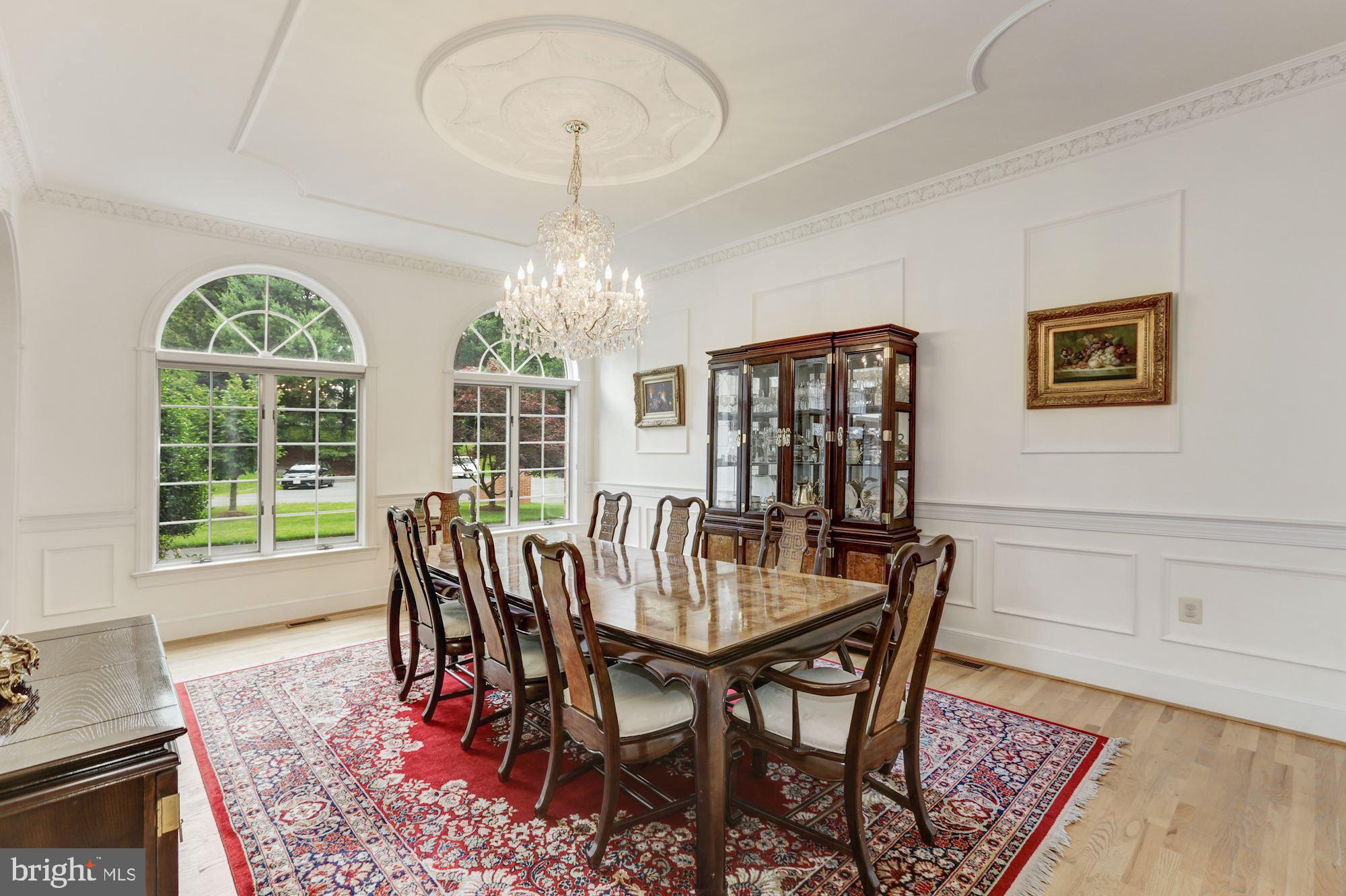 914 Helga Place McLean, VA 22102 - Photo 21 of 72 a view of a dining room with furniture window and wooden floor