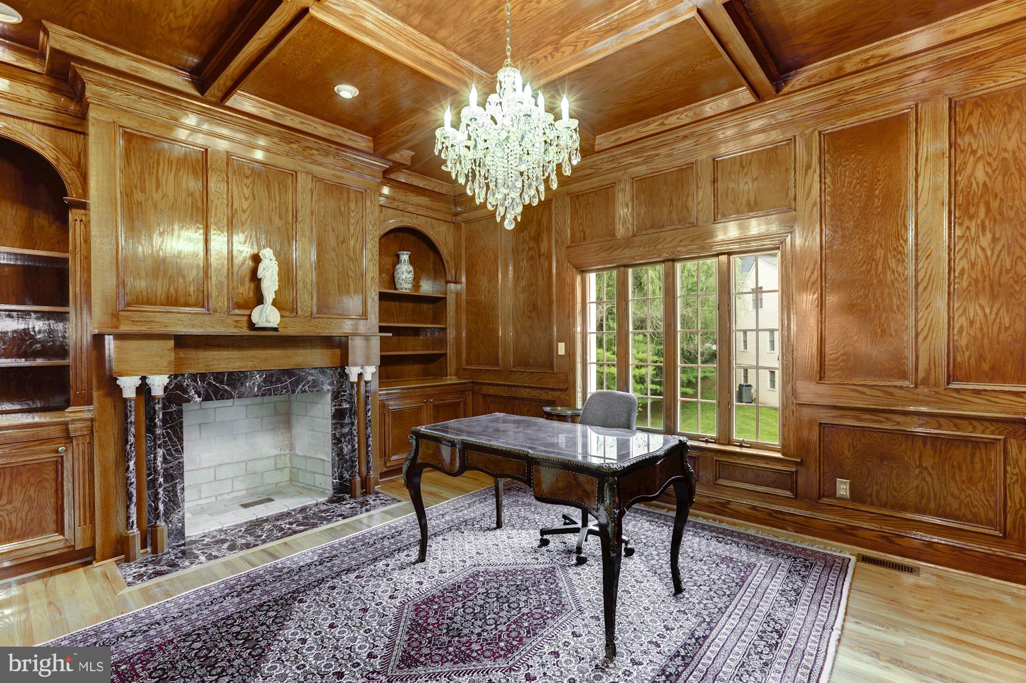 914 Helga Place McLean, VA 22102 - Photo 22 of 72 a view of a livingroom with furniture window and wooden floor