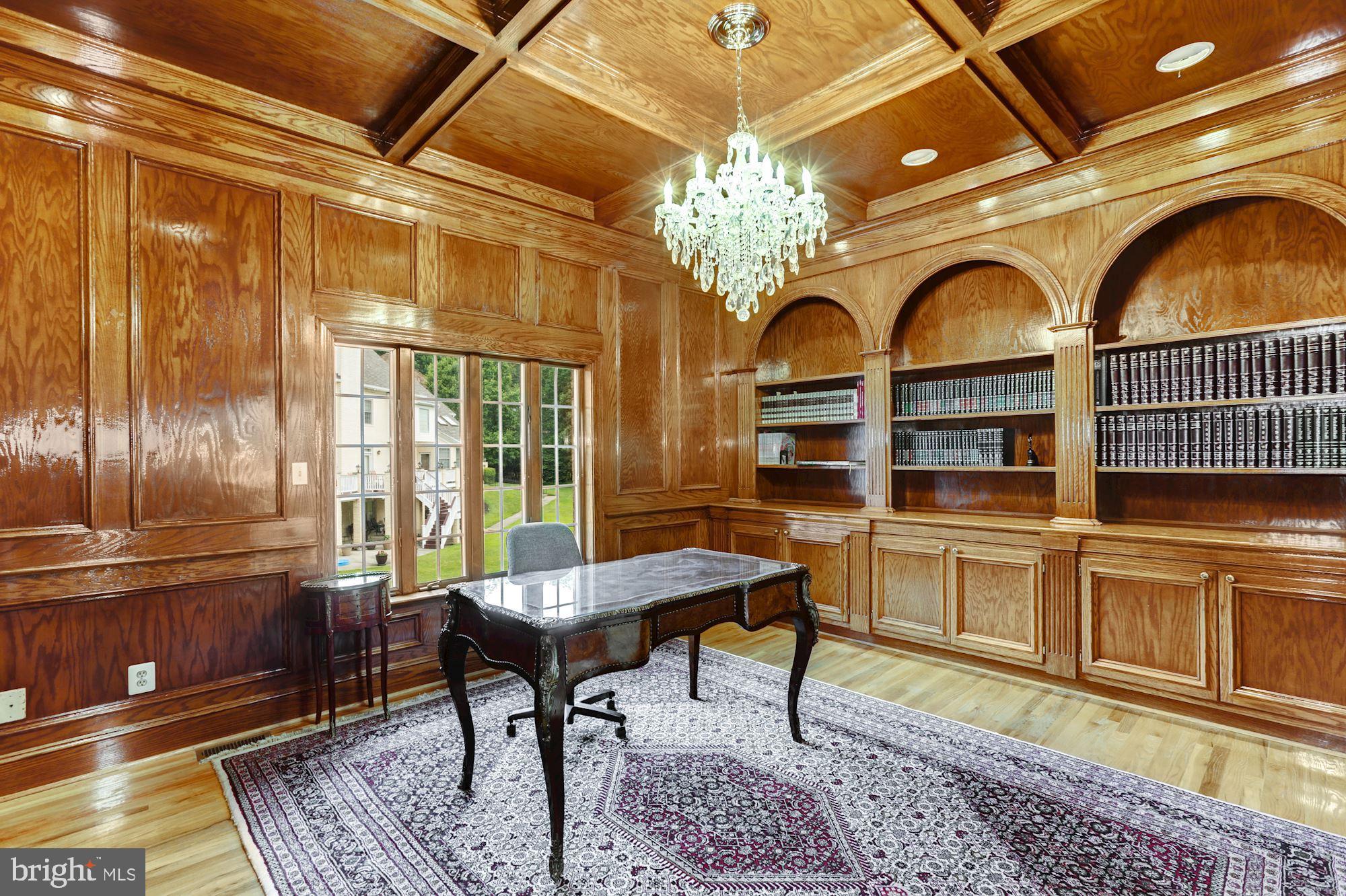 914 Helga Place McLean, VA 22102 - Photo 23 of 72 a view of a dining room with furniture a chandelier and wooden floor