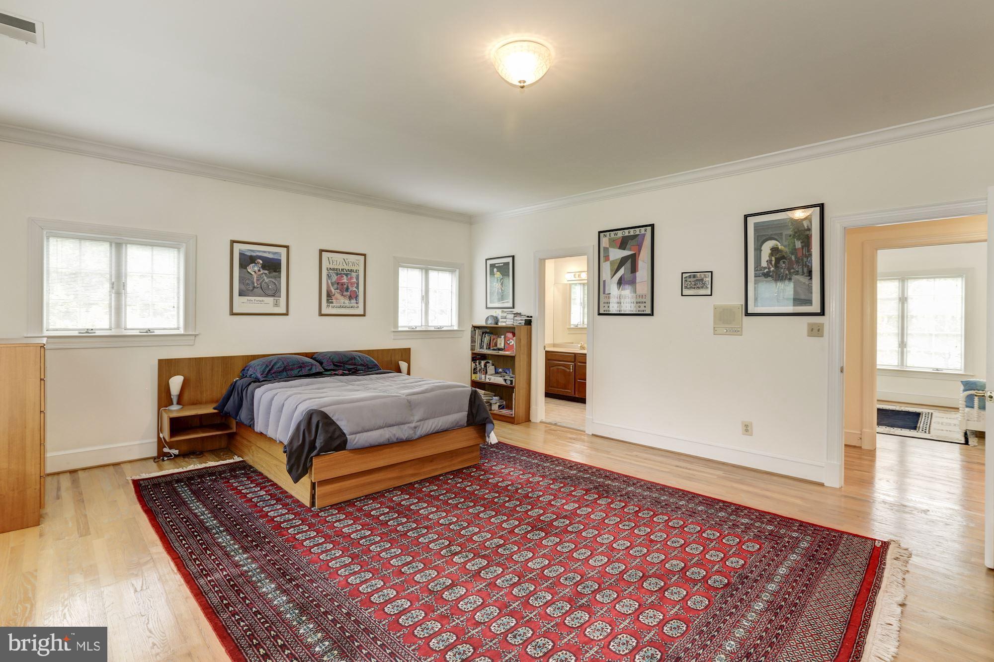 914 Helga Place McLean, VA 22102 - Photo 43 of 72 a bedroom with a rug and wooden floor