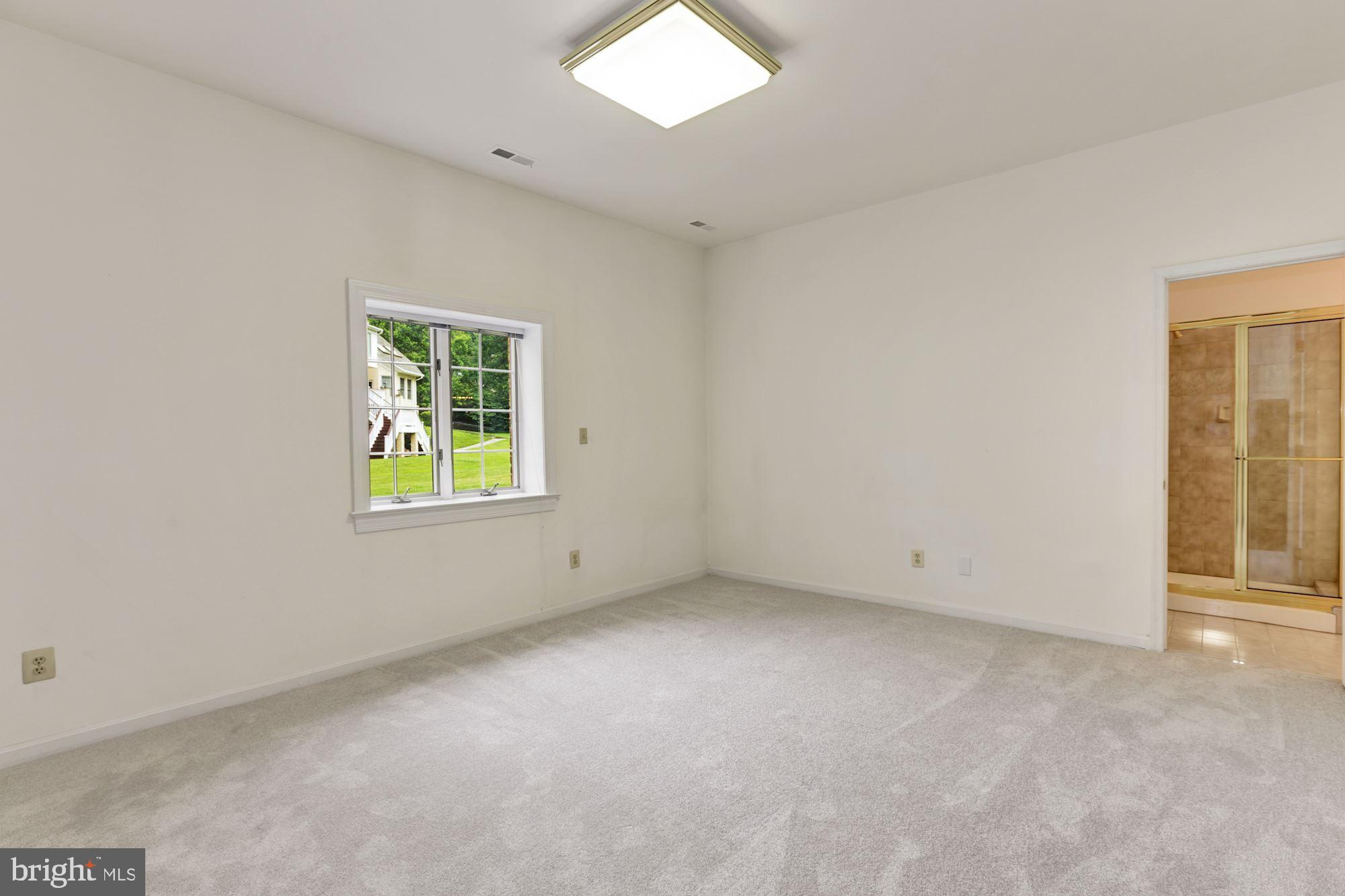 914 Helga Place McLean, VA 22102 - Photo 67 of 72 an empty room with windows