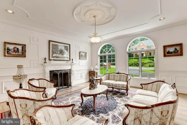 a large kitchen with kitchen island a sink stainless steel appliances and cabinets