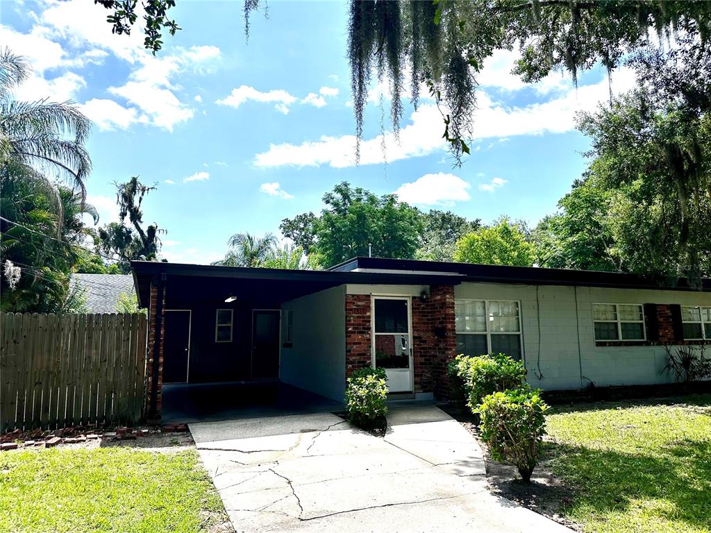 1815 Hackney Avenue Orlando, FL 32806 - Photo 1 of 1 a view of a house with a yard
