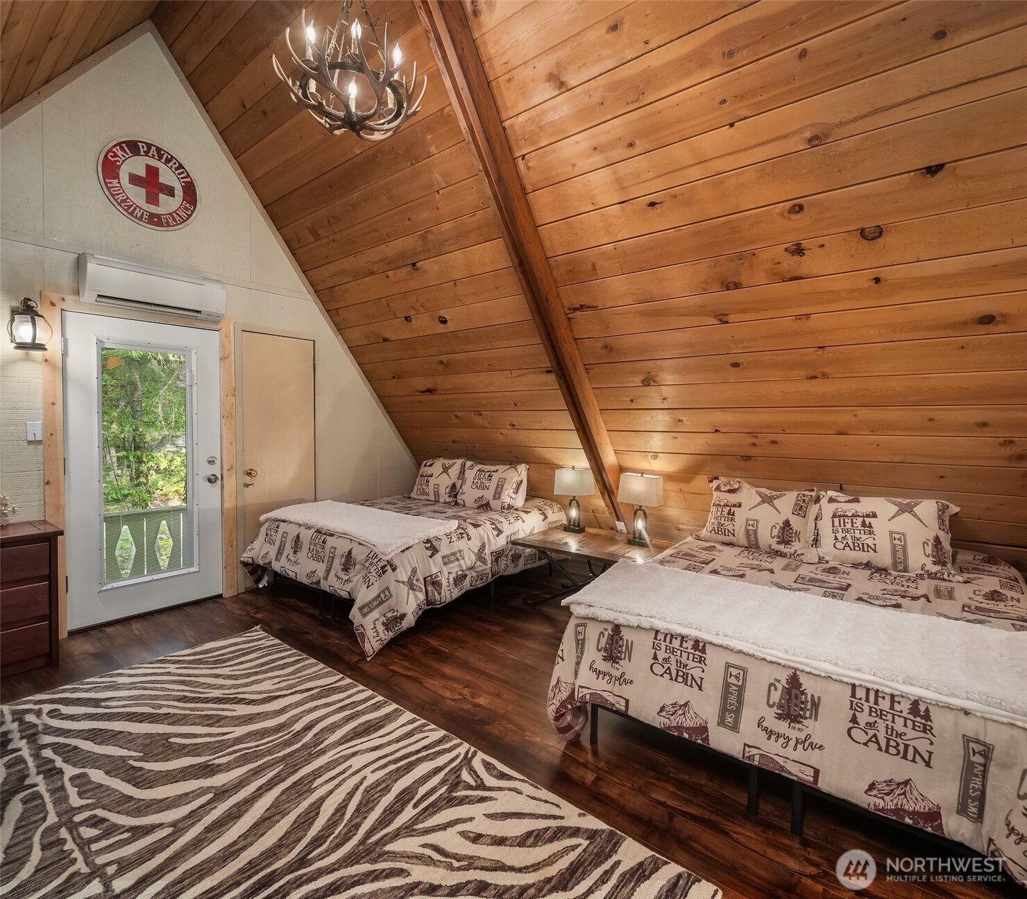 131 Timberline Drive West Packwood, WA 98361 - Photo 11 of 30 a bedroom with a bed and a window