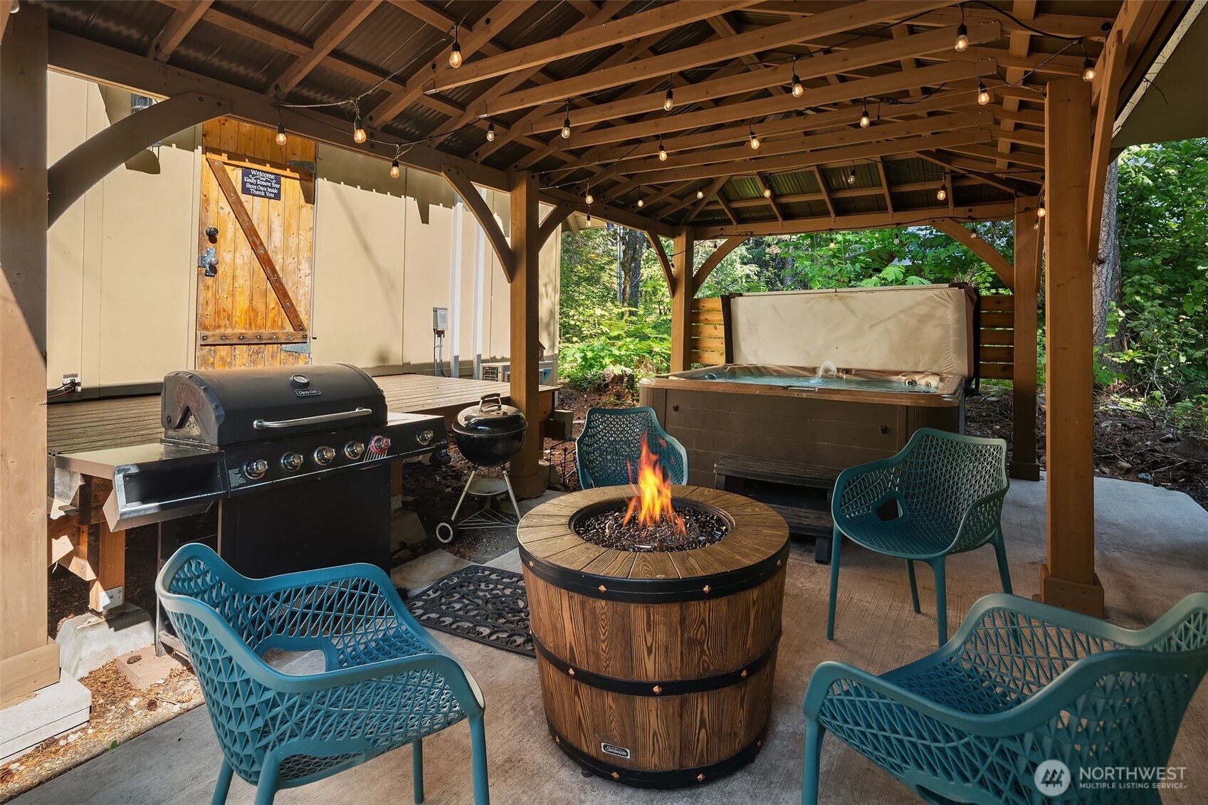 131 Timberline Drive West Packwood, WA 98361 - Photo 16 of 30 a living room with furniture and a wooden floor