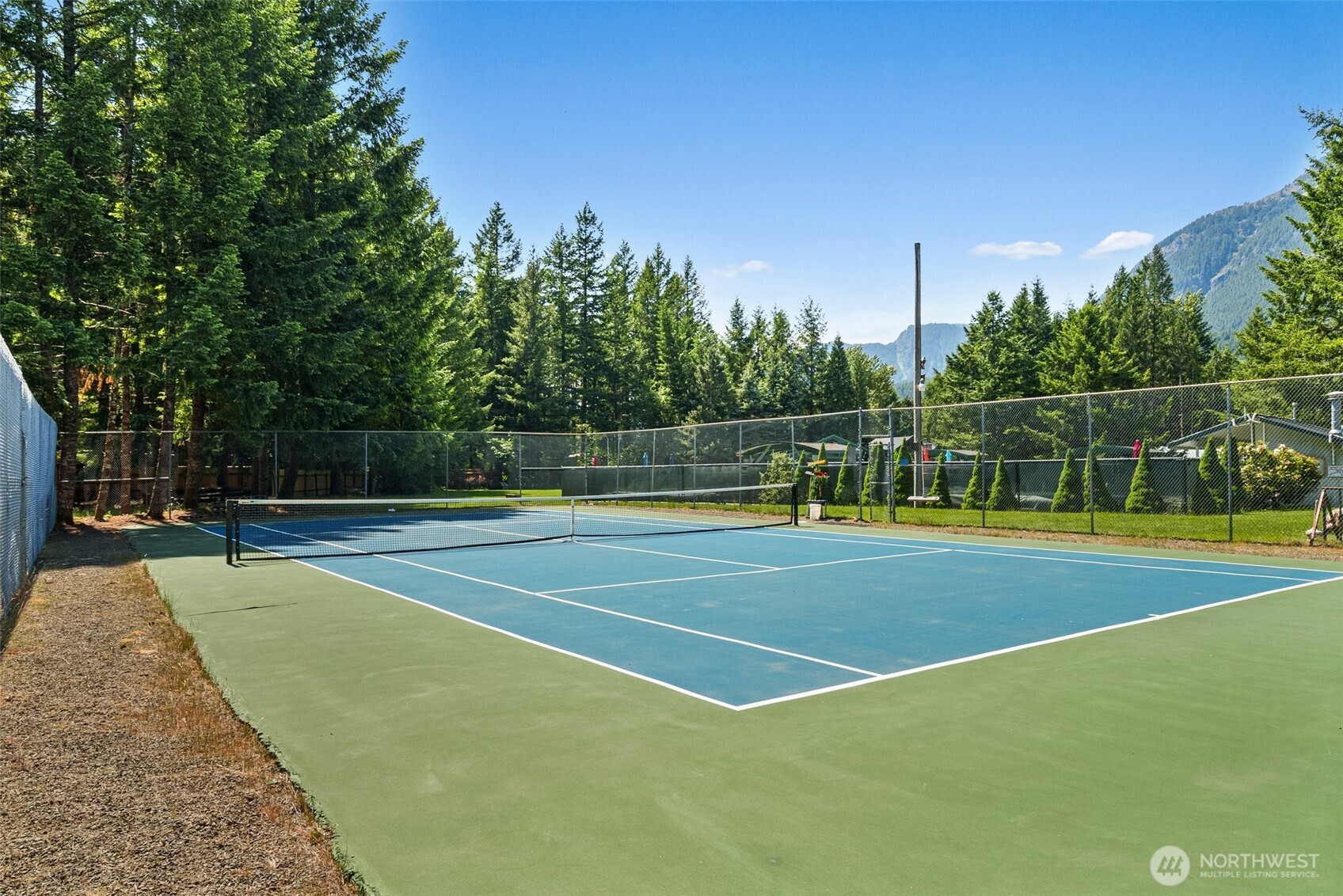 131 Timberline Drive West Packwood, WA 98361 - Photo 28 of 30 a view of a tennis court
