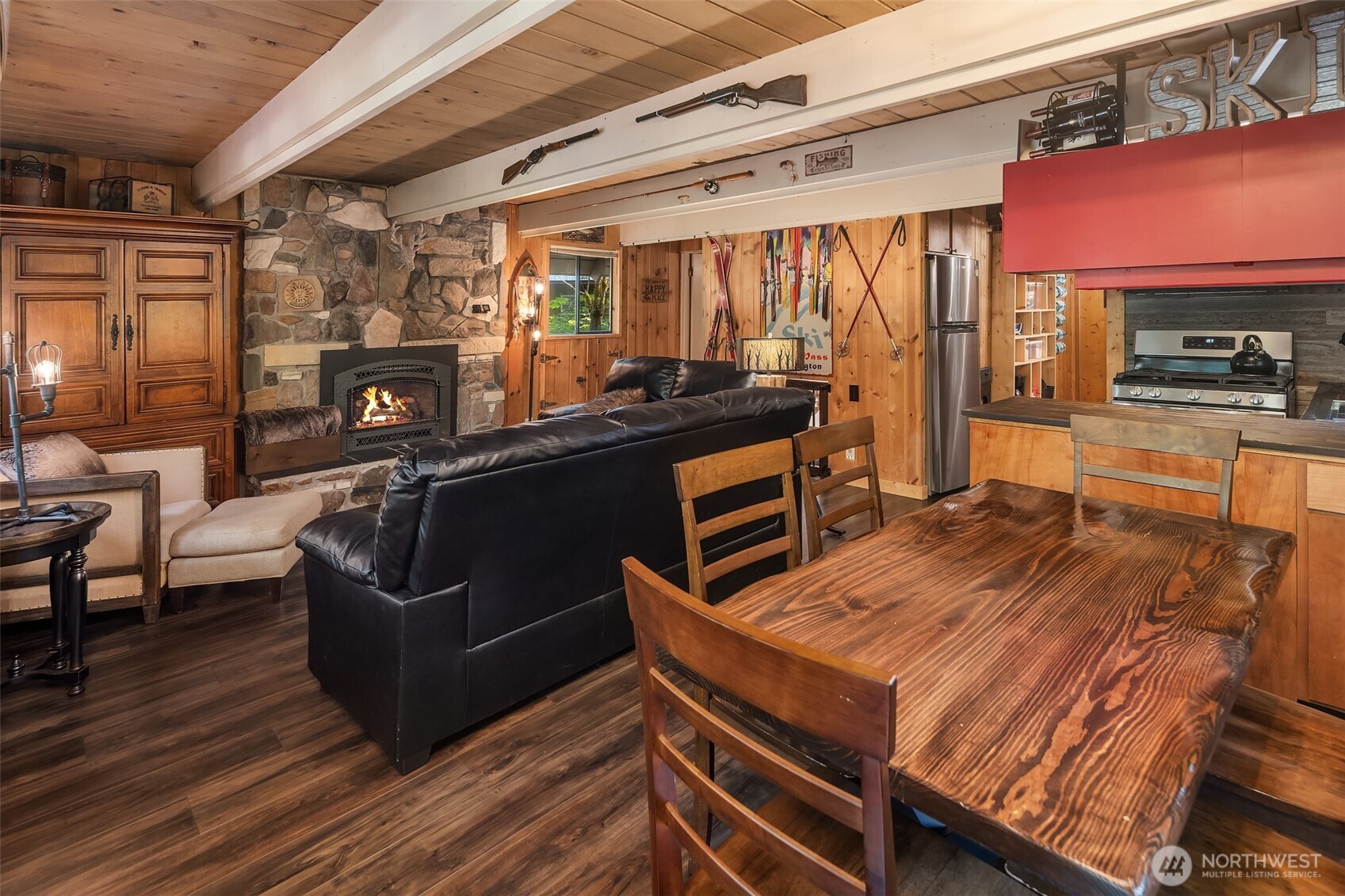 131 Timberline Drive West Packwood, WA 98361 - Photo 3 of 30 a kitchen with stainless steel appliances wooden floor a stove and a refrigerator
