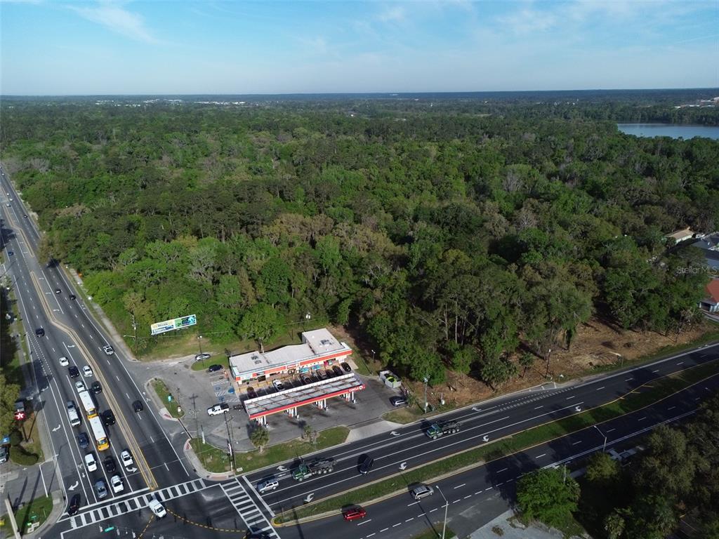 3926 Southwest 13th Street Gainesville, FL 32608 - Photo 11 of 12 a view of a yard with an outdoor seating