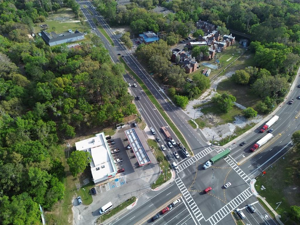 3926 Southwest 13th Street Gainesville, FL 32608 - Photo 9 of 12 an aerial view of multiple houses with yard