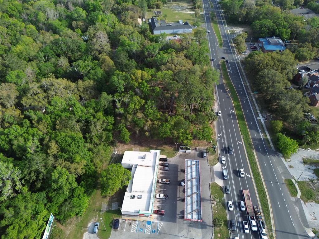 3926 Southwest 13th Street Gainesville, FL 32608 - Photo 10 of 12 an aerial view of multiple houses with yard