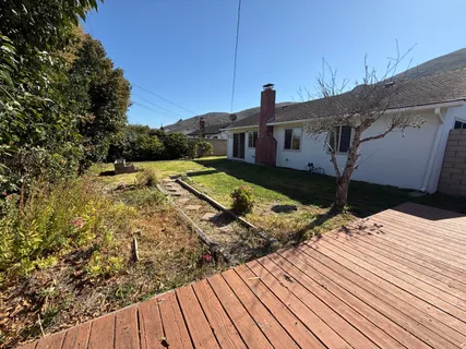 a house view with a outdoor space