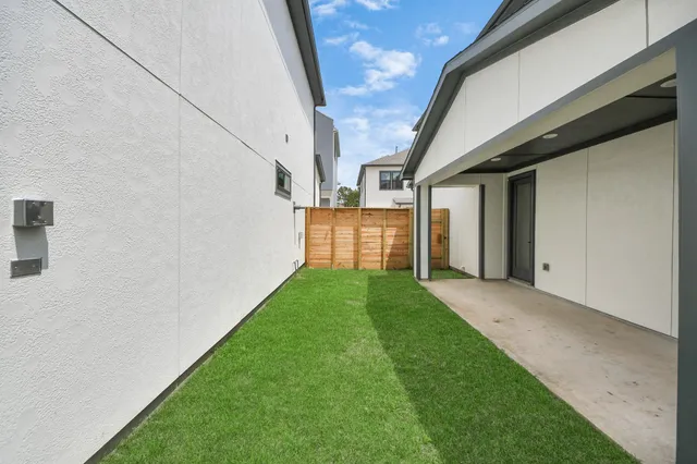 a view of a back yard of the house