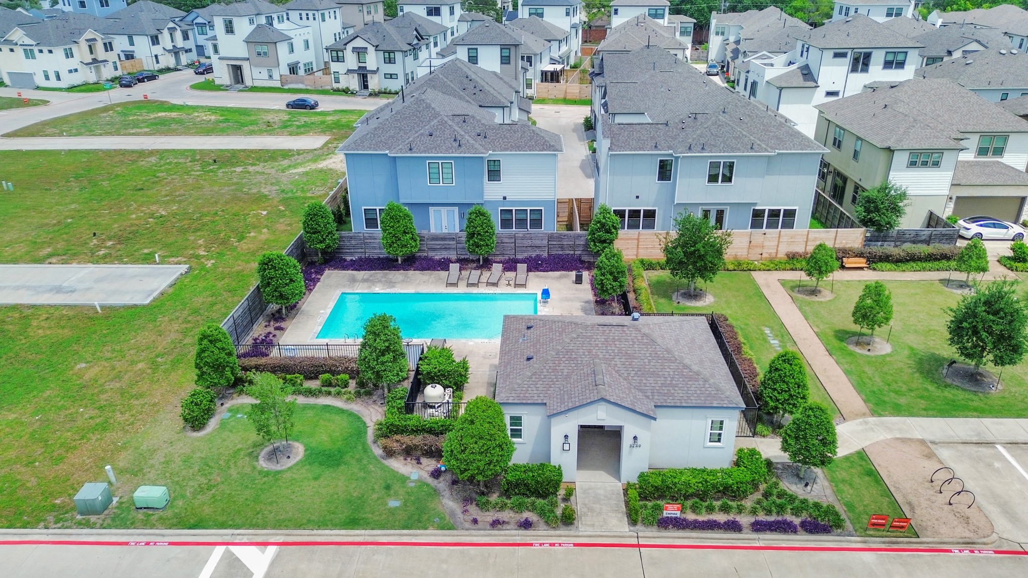 12010 Royal Oaks Banner Way Houston, TX 77082 - Photo 39 of 43 a aerial view of a house with swimming pool a yard and outdoor seating