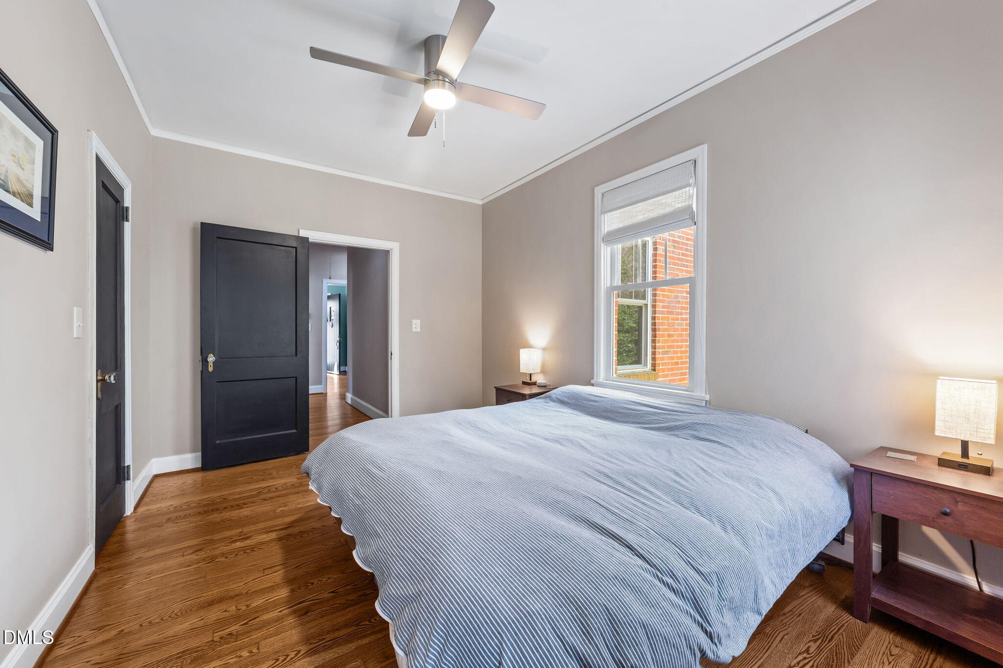 3322 Ruffin Street Raleigh, NC 27607 - Photo 30 of 57 a bedroom with a bed and a window
