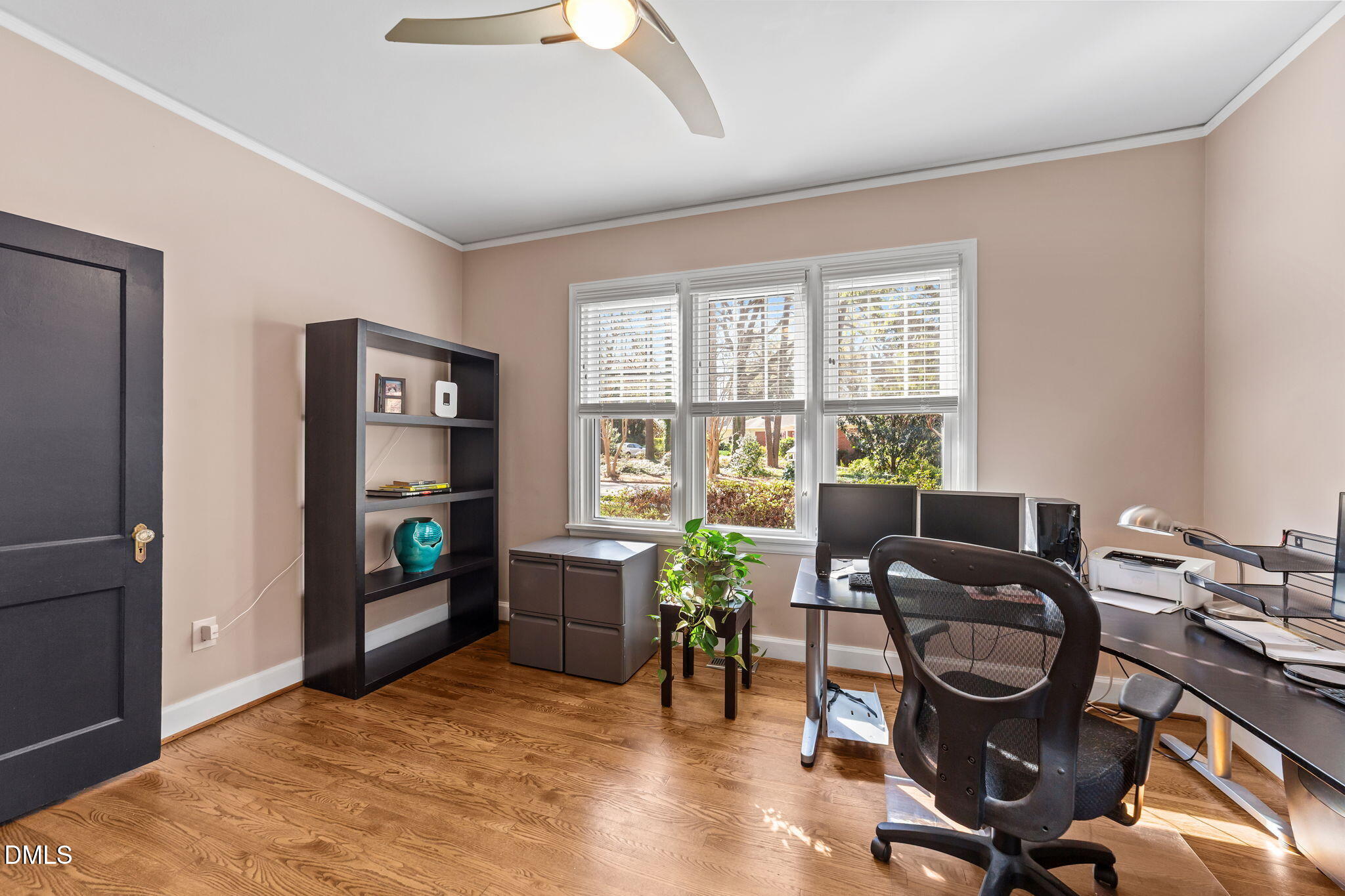 3322 Ruffin Street Raleigh, NC 27607 - Photo 34 of 57 a view of a workspace with furniture and a window