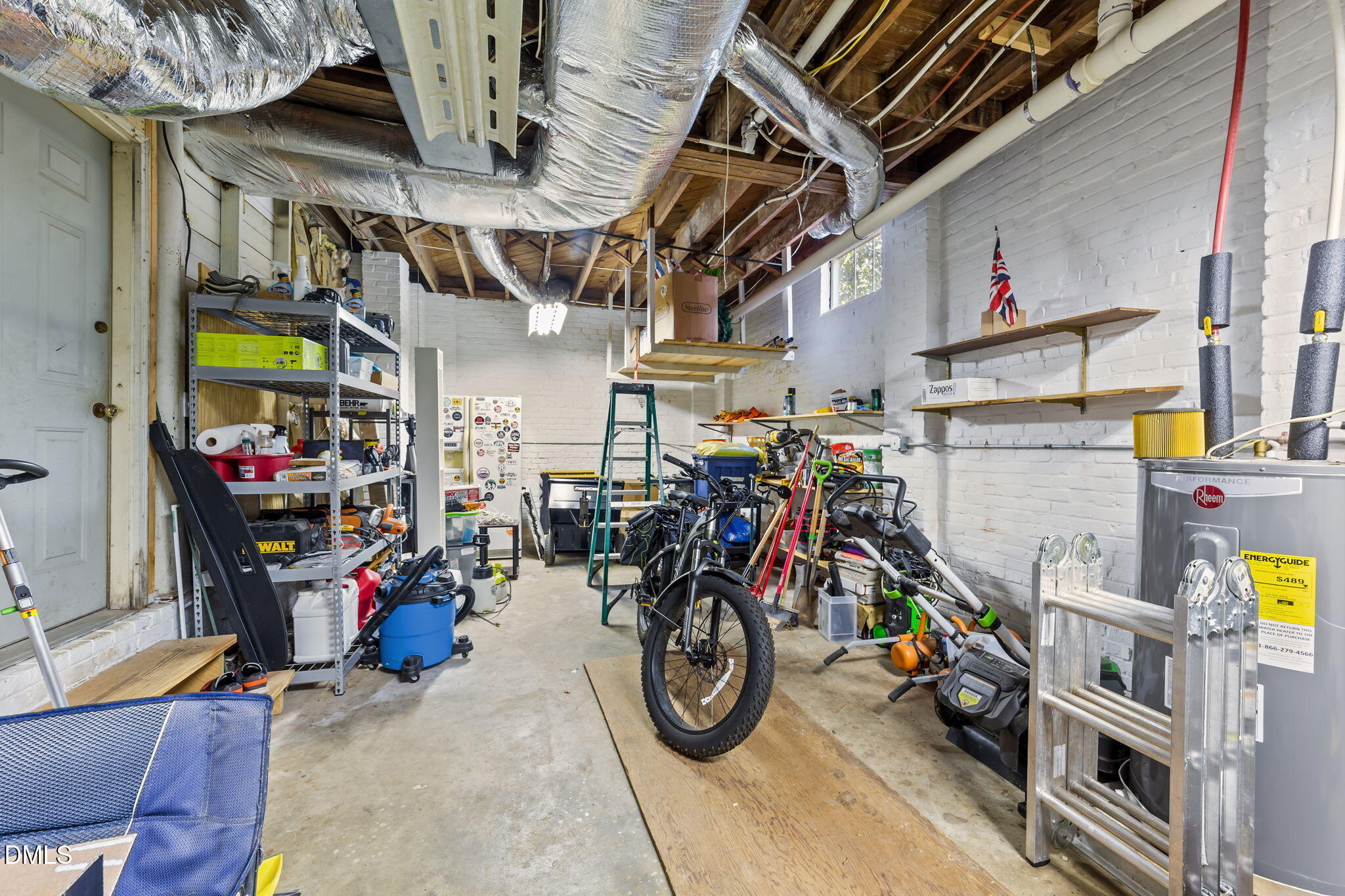 3322 Ruffin Street Raleigh, NC 27607 - Photo 44 of 57 a view of a storage area with bicycles