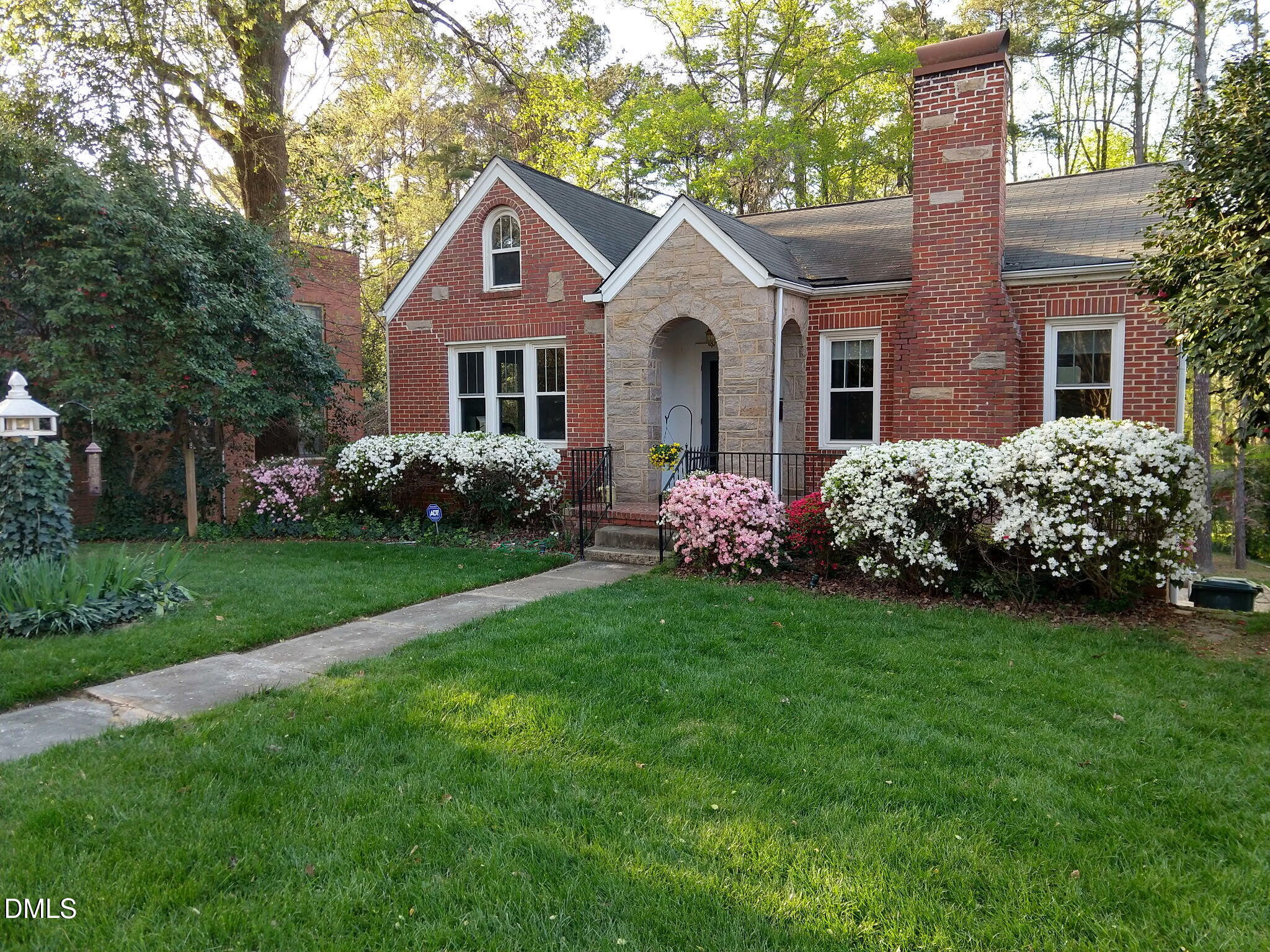 3322 Ruffin Street Raleigh, NC 27607 - Photo 3 of 57 a front view of a house with garden