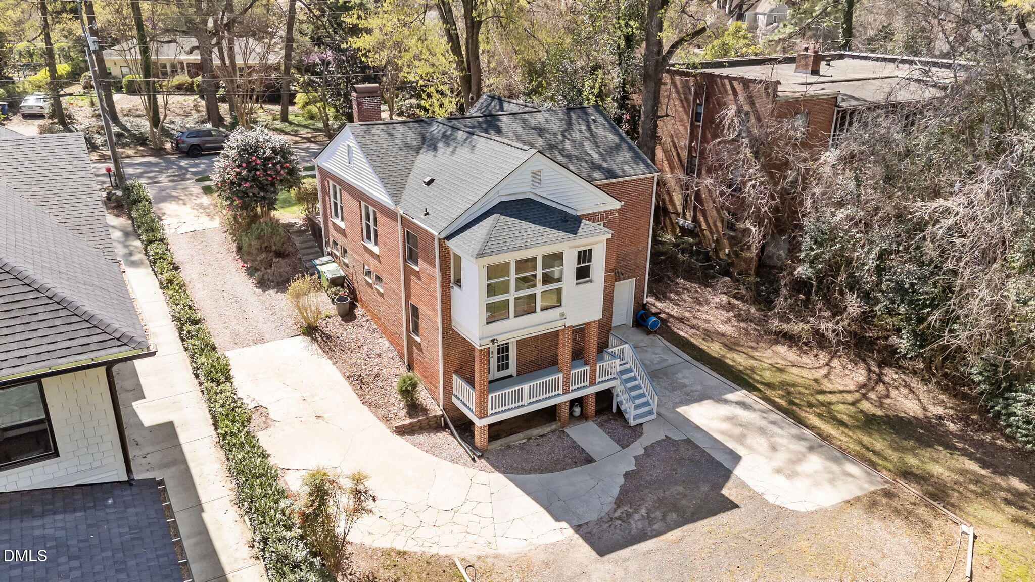 3322 Ruffin Street Raleigh, NC 27607 - Photo 45 of 57 a view of a house with a yard