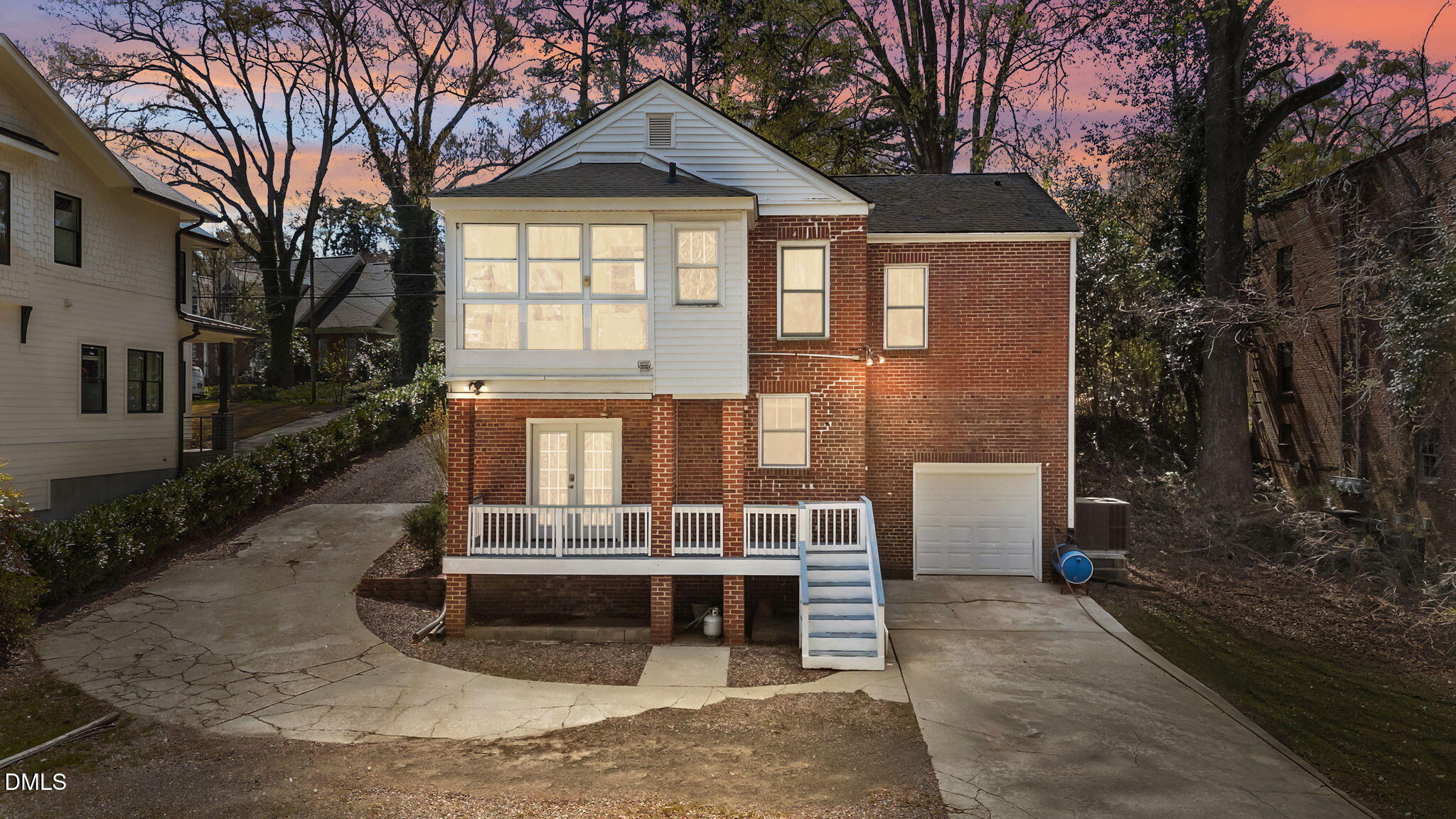 3322 Ruffin Street Raleigh, NC 27607 - Photo 50 of 57 a front view of a house with a yard