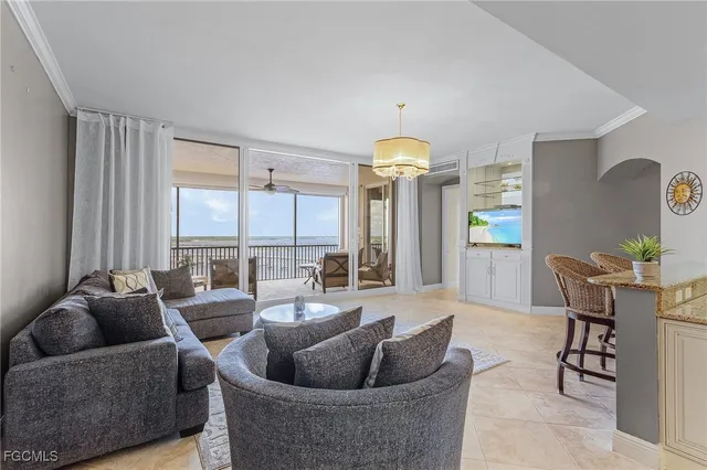 a view of a chairs and table in the balcony