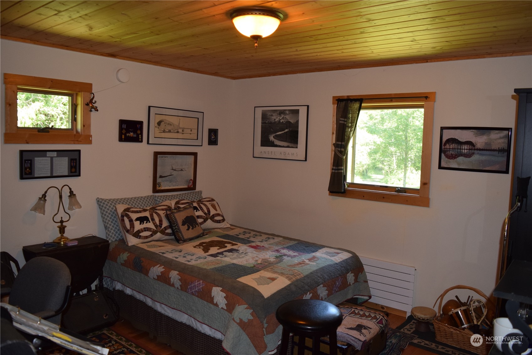 124 Larson Lake Road Chimacum, WA 98325 - Photo 8 of 39 a bedroom with a bed and a window