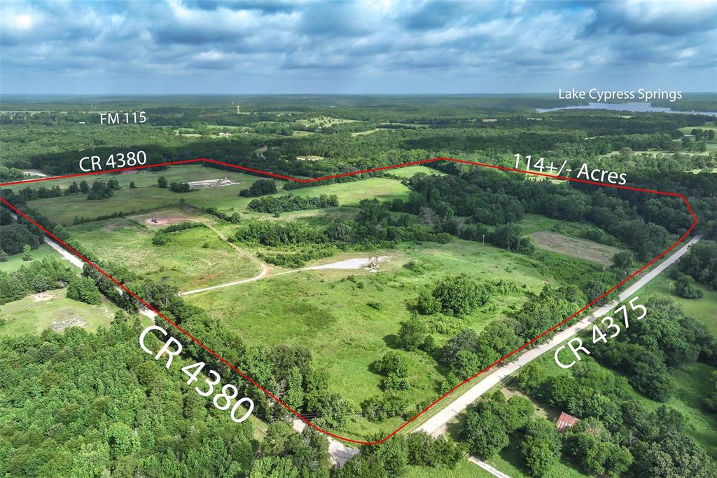 503 County Rd SE 4380 Scroggins, TX 75480 - Photo 2 of 40 a view of a green field with an ocean