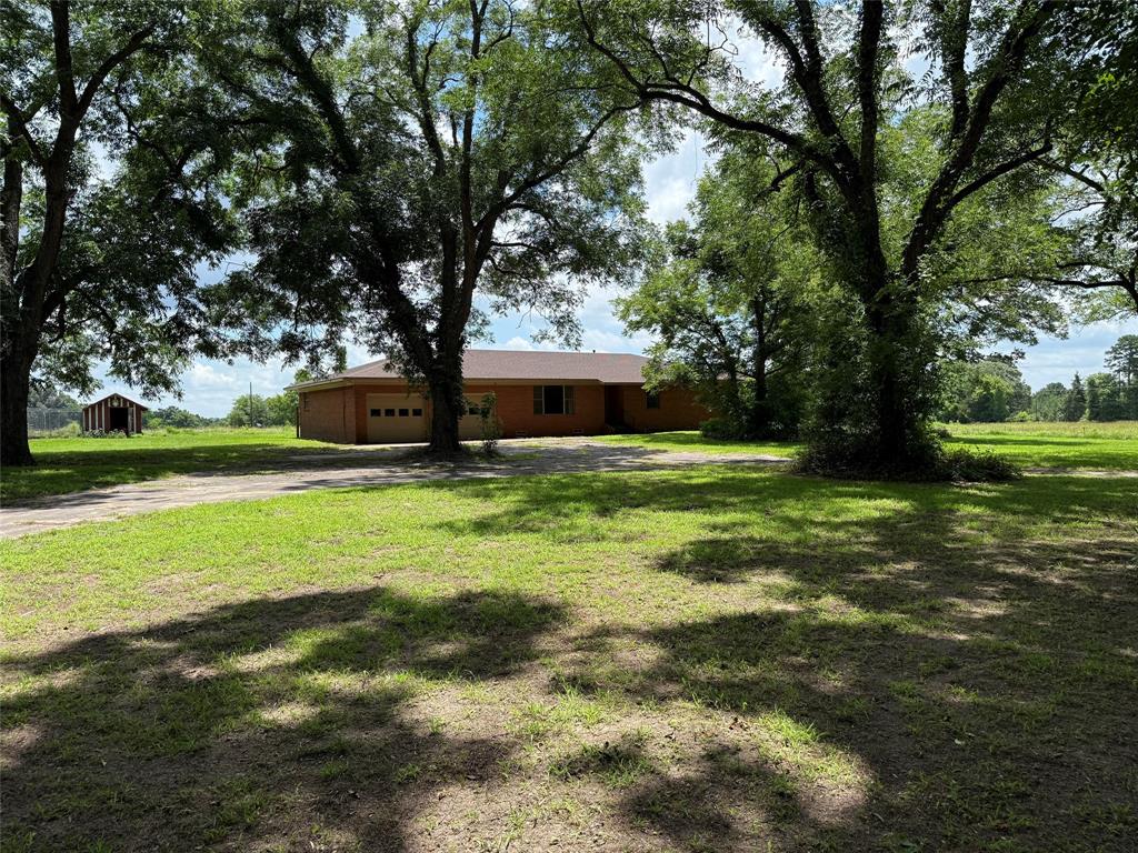 503 County Rd SE 4380 Scroggins, TX 75480 - Photo 10 of 40 a view of a house with a yard