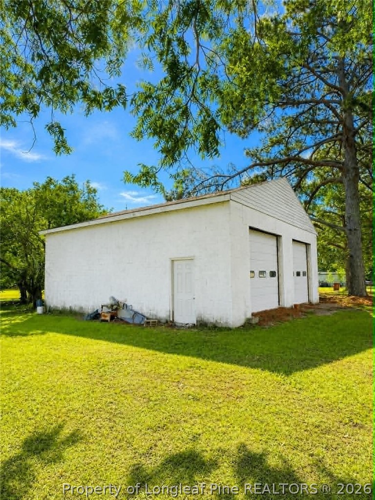4435 Tartt's Mill Road Wilson, NC 27893 - Photo 21 of 23 a view of yard with swimming pool and green space