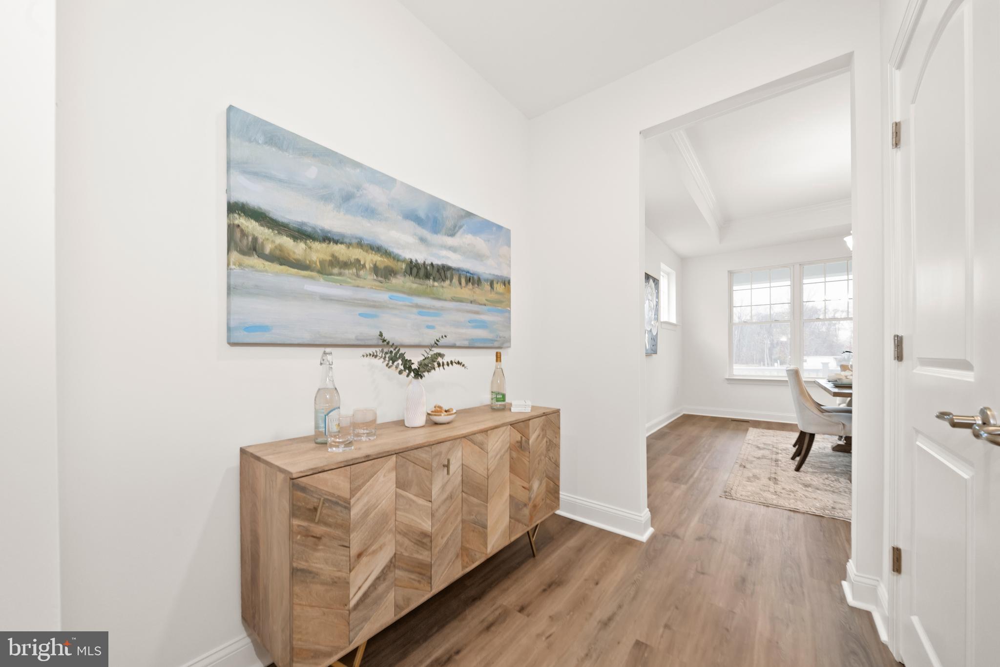 548 Longhorn Loop Middletown, DE 19709 - Photo 17 of 38 a living room with furniture and a wooden floor