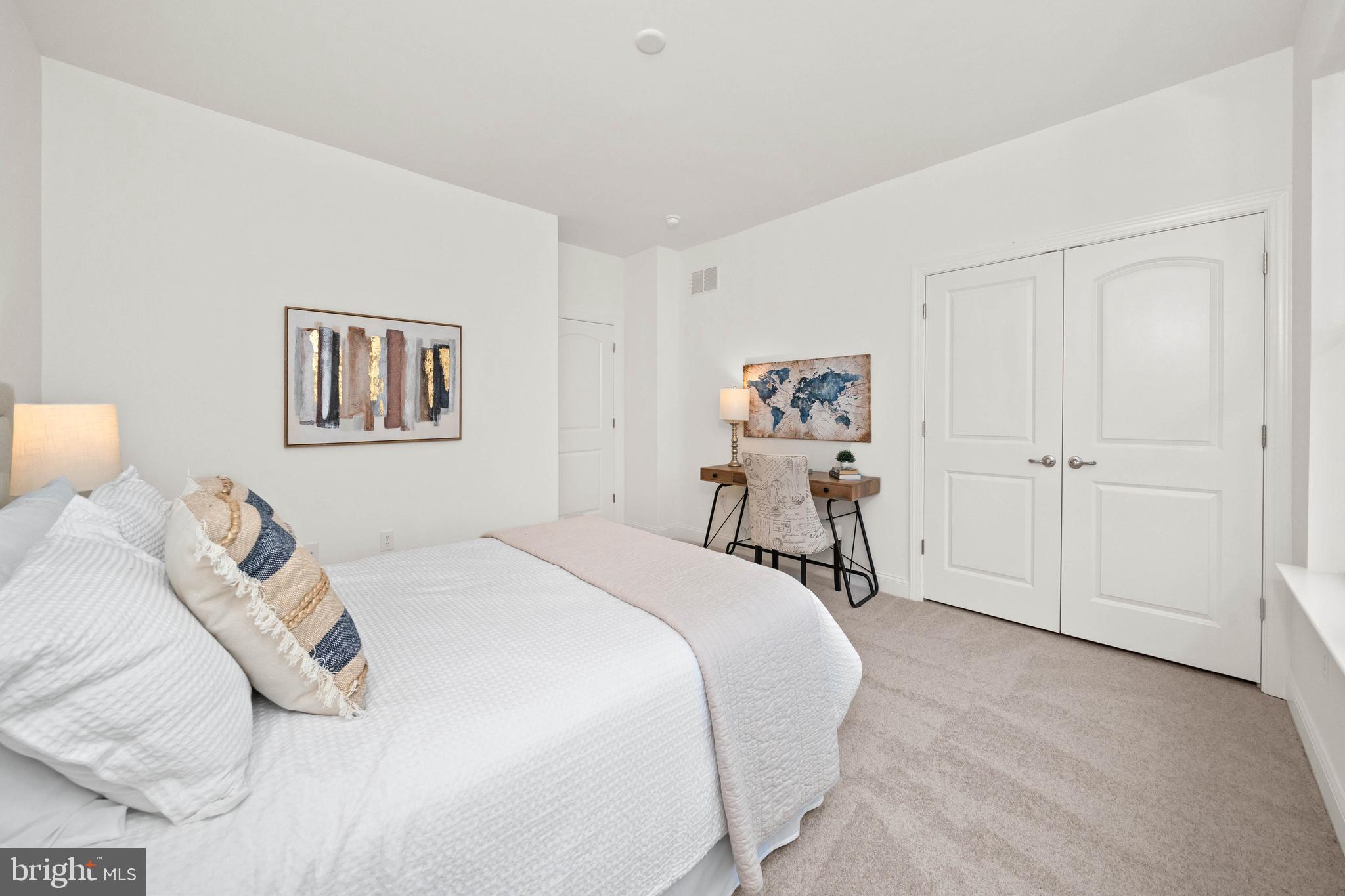 548 Longhorn Loop Middletown, DE 19709 - Photo 25 of 38 a bed room with a bed and a chair