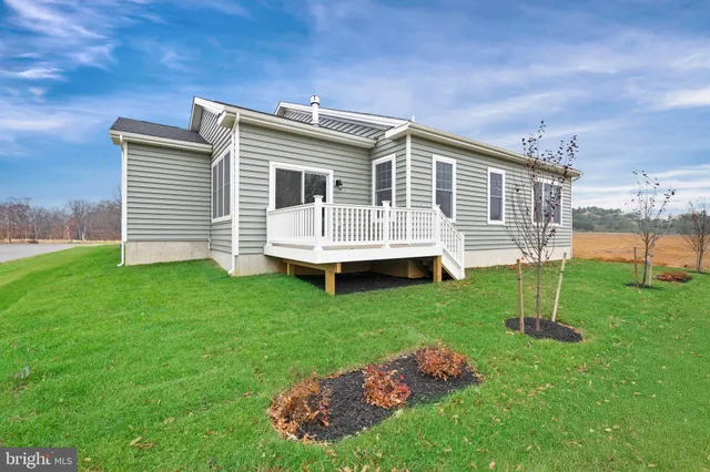 a front view of house with yard