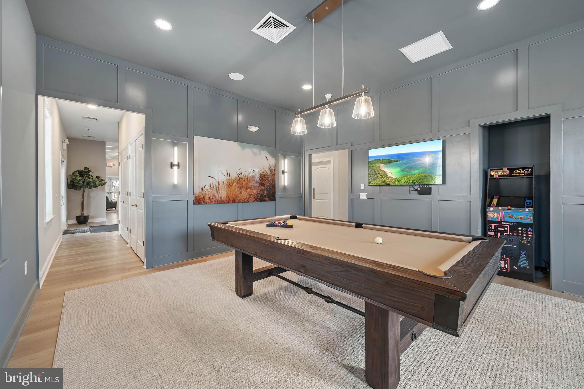 548 Longhorn Loop Middletown, DE 19709 - Photo 33 of 38 a room with pool table and a chandelier