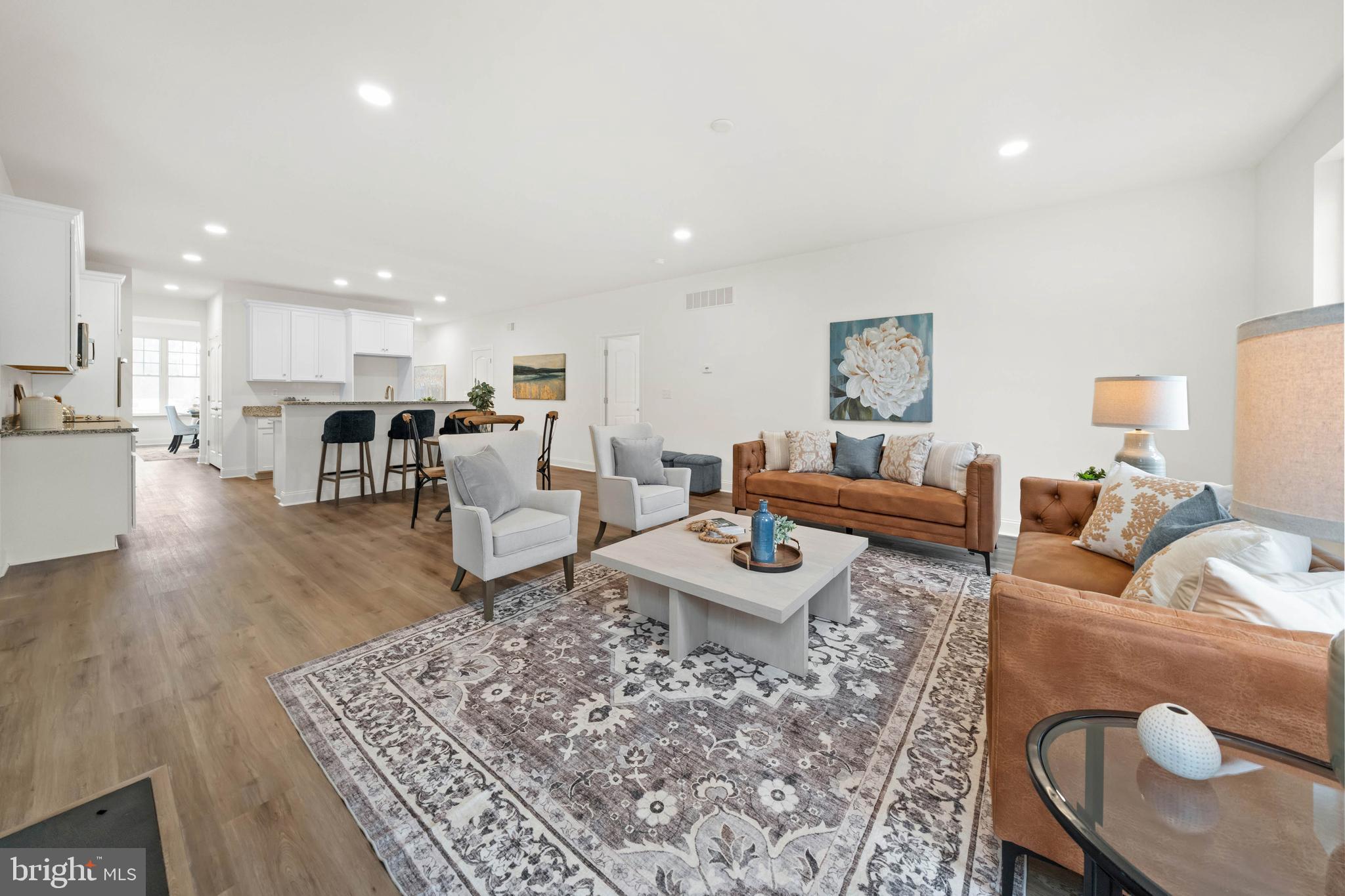 548 Longhorn Loop Middletown, DE 19709 - Photo 8 of 38 a living room with furniture and a wooden floor