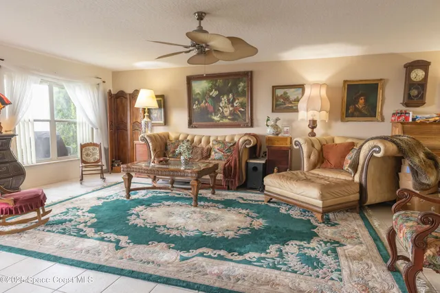 a view of a building with car parked