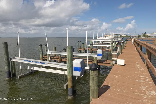 a living room with furniture a rug and a window
