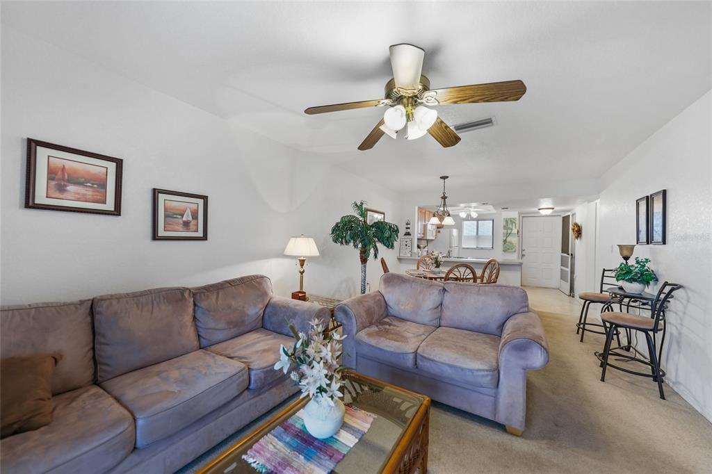 25225 Rampart Boulevard, Unit 1607 Punta Gorda, FL 33983 - Photo 12 of 48 a living room with furniture