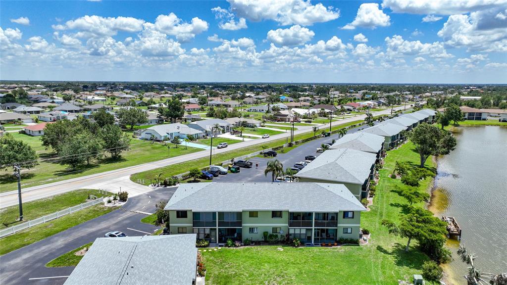 25225 Rampart Boulevard, Unit 1607 Punta Gorda, FL 33983 - Photo 30 of 48 an aerial view of a house with a garden
