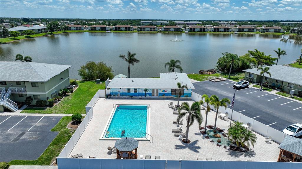 25225 Rampart Boulevard, Unit 1607 Punta Gorda, FL 33983 - Photo 3 of 48 an aerial view of a house with outdoor space and lake view