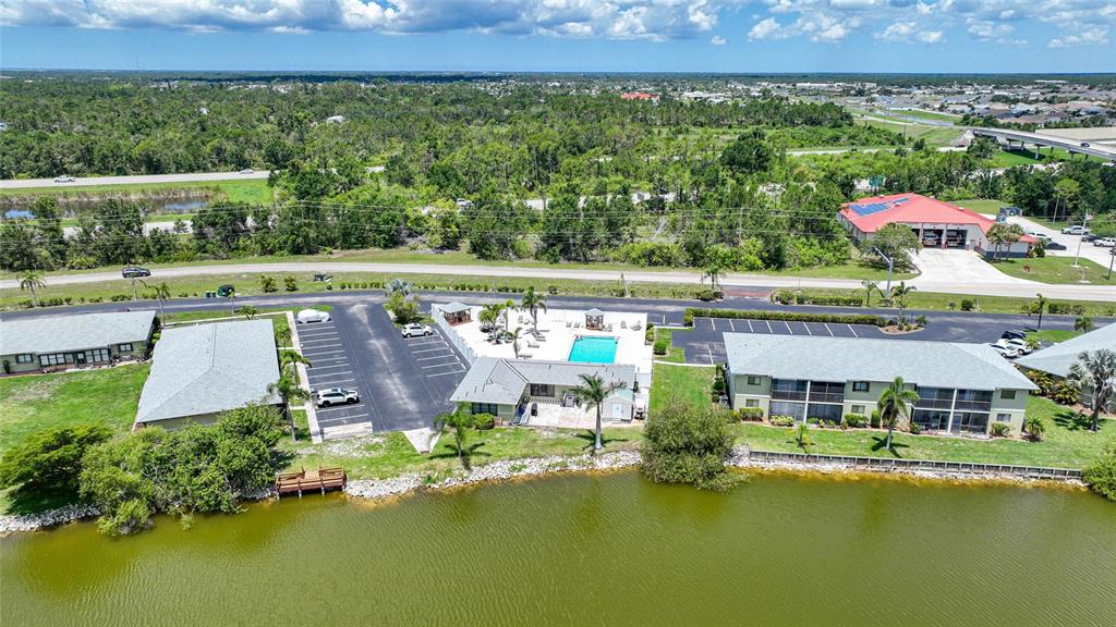 25225 Rampart Boulevard, Unit 1607 Punta Gorda, FL 33983 - Photo 48 of 48 an aerial view of a house with swimming pool garden and outdoor seating