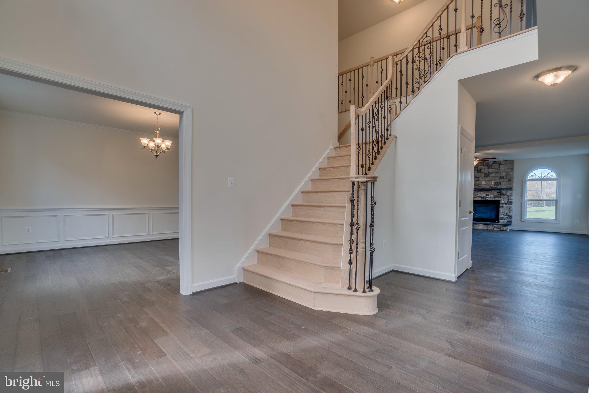 499 Joshua Road Stafford, VA 22556 - Photo 14 of 37 Elegant entryway with sweeping staircase.